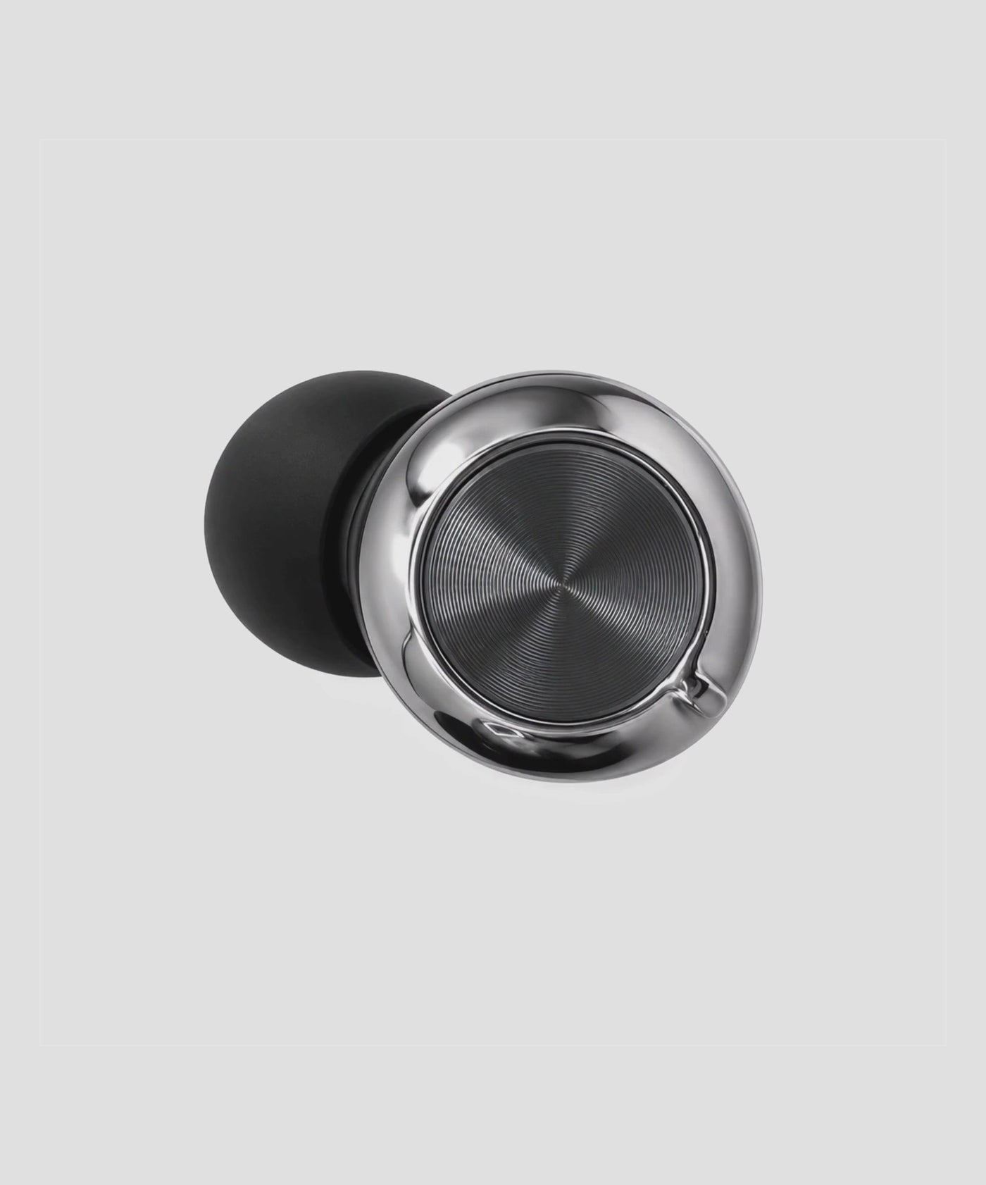 MYUT THREE. earplug shown assembled, then separating into its layers